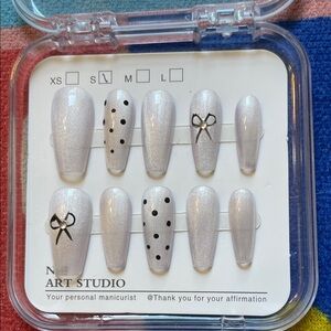 Pearl White Press On Nails with Black Bow Design